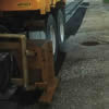The Edger skis float to follow the existing surface heights as seen around the storm drain inlet.<br />The door that releases the product can be opened and closed, as required, as shown when passing a driveway.<br />This example of the Pavement Edger working was done in Wellesley Township and took approximately 5-7 minutes.